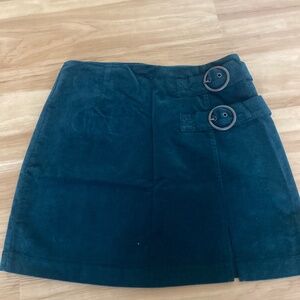 Green corduroy buckle detail skirt